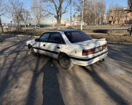 Белый Мазда 626, объемом двигателя 0 л и пробегом 325 тыс. км за 800 $, фото 1 на Automoto.ua