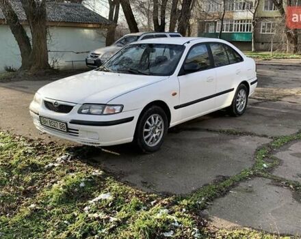 Белый Мазда 626, объемом двигателя 1.8 л и пробегом 321 тыс. км за 3500 $, фото 1 на Automoto.ua