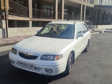 Белый Мазда 626, объемом двигателя 2 л и пробегом 610 тыс. км за 1750 $, фото 1 на Automoto.ua