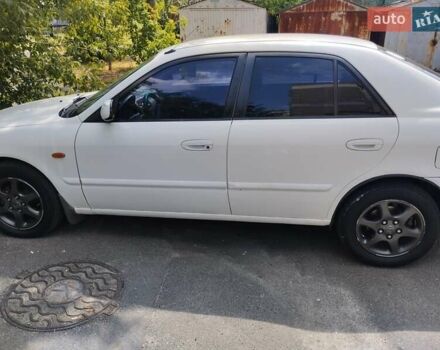 Белый Мазда 626, объемом двигателя 2 л и пробегом 500 тыс. км за 2399 $, фото 1 на Automoto.ua