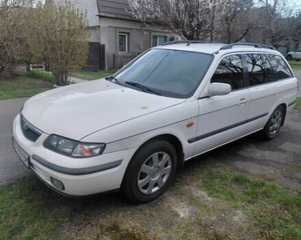 Белый Мазда 626, объемом двигателя 2 л и пробегом 277 тыс. км за 3500 $, фото 1 на Automoto.ua