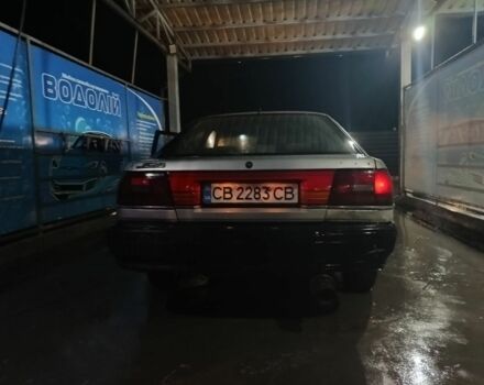 Бежевый Мазда 626, объемом двигателя 2 л и пробегом 460 тыс. км за 426 $, фото 7 на Automoto.ua