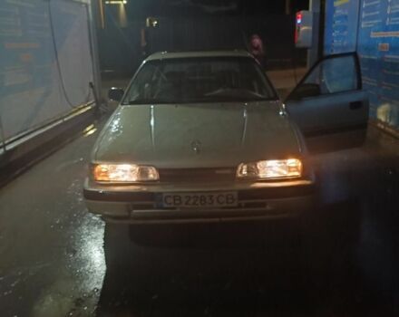 Бежевый Мазда 626, объемом двигателя 2 л и пробегом 460 тыс. км за 426 $, фото 5 на Automoto.ua