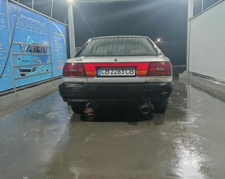 Бежевый Мазда 626, объемом двигателя 2 л и пробегом 460 тыс. км за 426 $, фото 6 на Automoto.ua