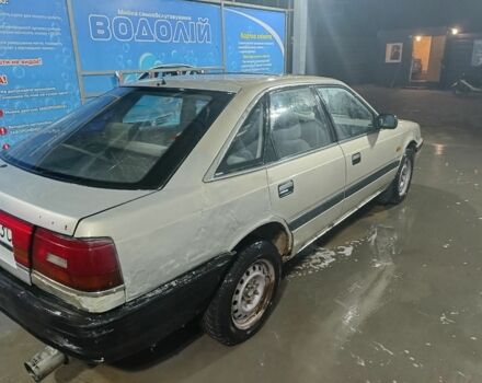 Бежевый Мазда 626, объемом двигателя 2 л и пробегом 460 тыс. км за 426 $, фото 3 на Automoto.ua