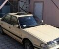 Бежевий Мазда 626, об'ємом двигуна 2 л та пробігом 357 тис. км за 1750 $, фото 1 на Automoto.ua