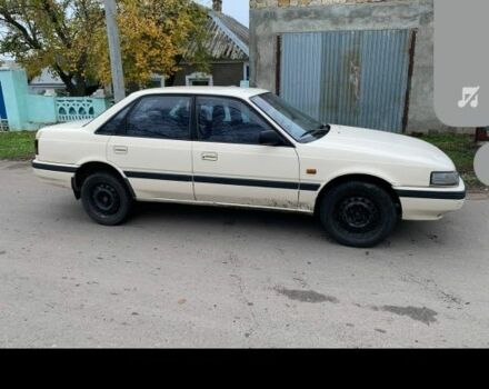 Бежевый Мазда 626, объемом двигателя 2 л и пробегом 210 тыс. км за 1800 $, фото 5 на Automoto.ua