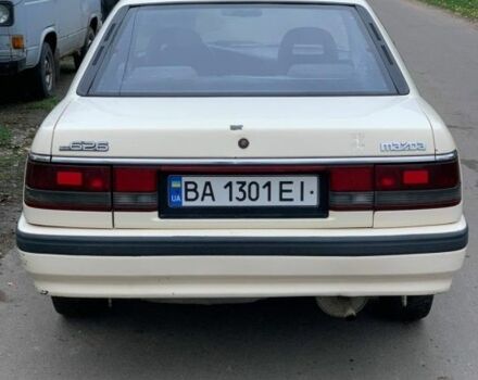 Бежевый Мазда 626, объемом двигателя 2 л и пробегом 210 тыс. км за 1800 $, фото 7 на Automoto.ua