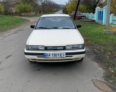 Бежевый Мазда 626, объемом двигателя 2 л и пробегом 210 тыс. км за 1800 $, фото 6 на Automoto.ua