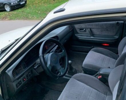 Бежевый Мазда 626, объемом двигателя 2 л и пробегом 210 тыс. км за 1800 $, фото 1 на Automoto.ua