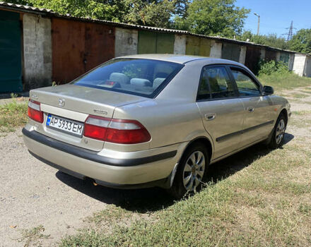 Бежевий Мазда 626, об'ємом двигуна 1.99 л та пробігом 303 тис. км за 2000 $, фото 1 на Automoto.ua
