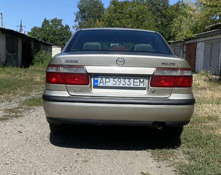 Бежевий Мазда 626, об'ємом двигуна 1.99 л та пробігом 303 тис. км за 2000 $, фото 3 на Automoto.ua