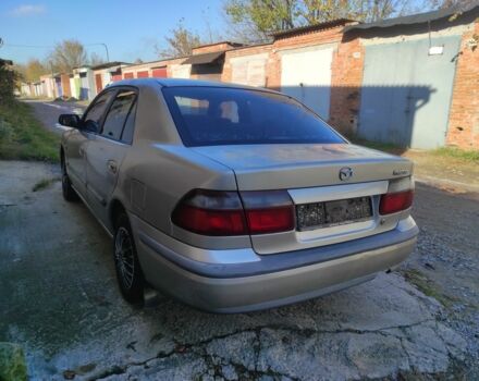 Бежевый Мазда 626, объемом двигателя 1.8 л и пробегом 249 тыс. км за 1450 $, фото 4 на Automoto.ua