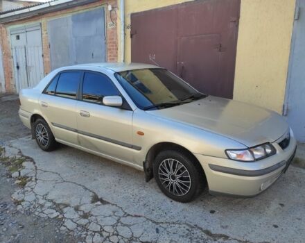 Бежевый Мазда 626, объемом двигателя 1.8 л и пробегом 249 тыс. км за 1450 $, фото 2 на Automoto.ua