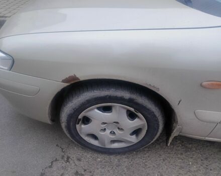 Бежевый Мазда 626, объемом двигателя 2 л и пробегом 300 тыс. км за 2800 $, фото 2 на Automoto.ua