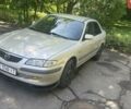 Бежевый Мазда 626, объемом двигателя 2 л и пробегом 340 тыс. км за 2800 $, фото 1 на Automoto.ua