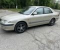 Бежевий Мазда 626, об'ємом двигуна 2 л та пробігом 313 тис. км за 2800 $, фото 1 на Automoto.ua