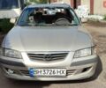 Бежевый Мазда 626, объемом двигателя 2 л и пробегом 279 тыс. км за 1900 $, фото 1 на Automoto.ua