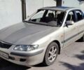 Бежевый Мазда 626, объемом двигателя 2 л и пробегом 279 тыс. км за 1900 $, фото 1 на Automoto.ua