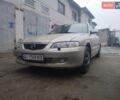 Бежевый Мазда 626, объемом двигателя 2 л и пробегом 356 тыс. км за 3800 $, фото 1 на Automoto.ua
