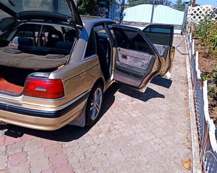 Бежевый Мазда 626, объемом двигателя 2 л и пробегом 500 тыс. км за 1150 $, фото 2 на Automoto.ua