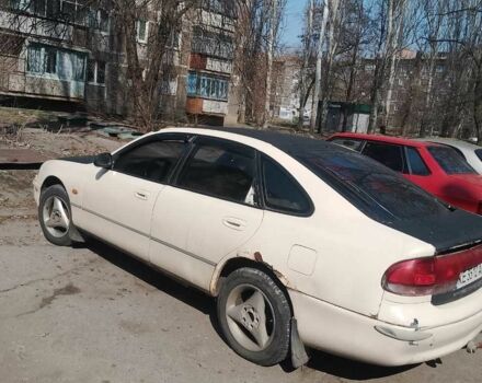 Бежевий Мазда 626, об'ємом двигуна 1.8 л та пробігом 400 тис. км за 639 $, фото 1 на Automoto.ua