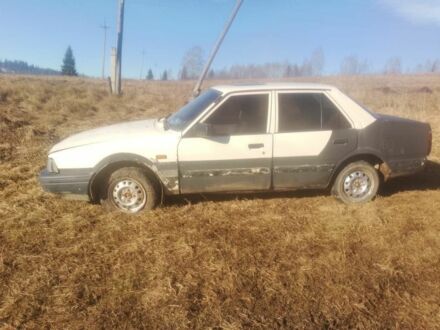 Бежевый Мазда 626, объемом двигателя 2 л и пробегом 200 тыс. км за 300 $, фото 1 на Automoto.ua