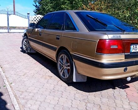 Бежевий Мазда 626, об'ємом двигуна 2 л та пробігом 500 тис. км за 1150 $, фото 1 на Automoto.ua