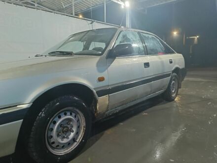 Бежевый Мазда 626, объемом двигателя 2 л и пробегом 460 тыс. км за 426 $, фото 1 на Automoto.ua