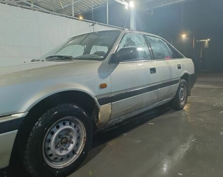 Бежевый Мазда 626, объемом двигателя 2 л и пробегом 460 тыс. км за 426 $, фото 1 на Automoto.ua