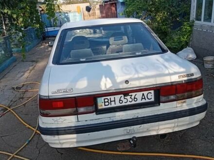 Бежевый Мазда 626, объемом двигателя 2 л и пробегом 200 тыс. км за 850 $, фото 1 на Automoto.ua