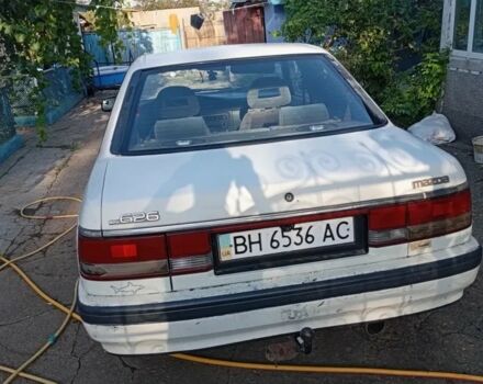 Бежевый Мазда 626, объемом двигателя 2 л и пробегом 200 тыс. км за 850 $, фото 1 на Automoto.ua