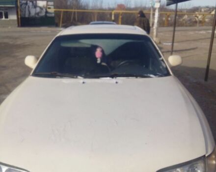 Бежевый Мазда 626, объемом двигателя 2 л и пробегом 390 тыс. км за 1600 $, фото 1 на Automoto.ua