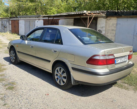 Бежевий Мазда 626, об'ємом двигуна 1.99 л та пробігом 303 тис. км за 2000 $, фото 1 на Automoto.ua