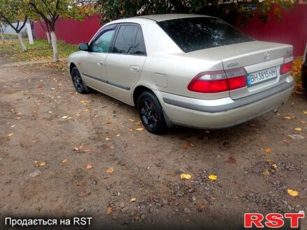 Бежевий Мазда 626, об'ємом двигуна 2 л та пробігом 277 тис. км за 2450 $, фото 1 на Automoto.ua