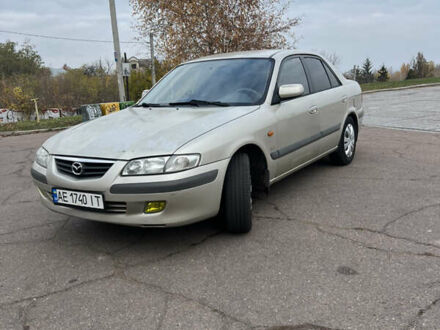 Бежевый Мазда 626, объемом двигателя 2 л и пробегом 335 тыс. км за 2299 $, фото 1 на Automoto.ua