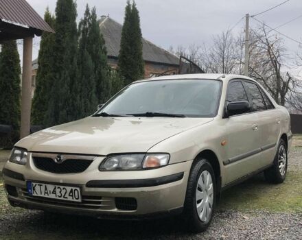 Бежевий Мазда 626, об'ємом двигуна 2 л та пробігом 310 тис. км за 1000 $, фото 1 на Automoto.ua