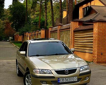 Бежевый Мазда 626, объемом двигателя 2 л и пробегом 210 тыс. км за 4100 $, фото 1 на Automoto.ua