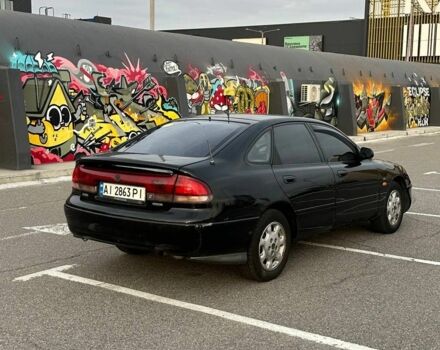 Черный Мазда 626, объемом двигателя 2.5 л и пробегом 483 тыс. км за 1200 $, фото 2 на Automoto.ua