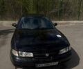 Черный Мазда 626, объемом двигателя 2.5 л и пробегом 380 тыс. км за 900 $, фото 1 на Automoto.ua