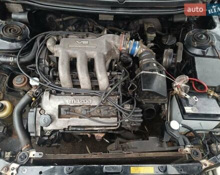 Черный Мазда 626, объемом двигателя 2.5 л и пробегом 480 тыс. км за 1400 $, фото 6 на Automoto.ua