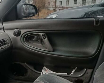 Черный Мазда 626, объемом двигателя 2.5 л и пробегом 480 тыс. км за 1400 $, фото 3 на Automoto.ua