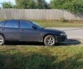 Черный Мазда 626, объемом двигателя 1.8 л и пробегом 500 тыс. км за 1802 $, фото 1 на Automoto.ua