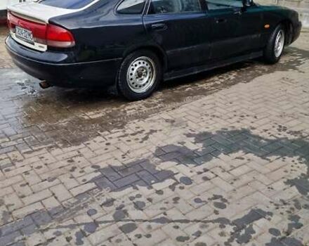 Черный Мазда 626, объемом двигателя 2.5 л и пробегом 380 тыс. км за 1500 $, фото 10 на Automoto.ua