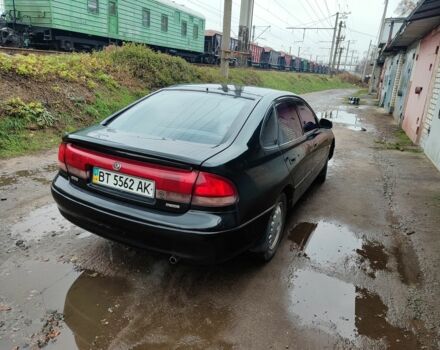 Черный Мазда 626, объемом двигателя 2 л и пробегом 573 тыс. км за 1100 $, фото 2 на Automoto.ua