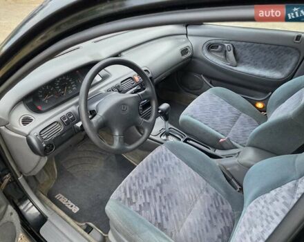Черный Мазда 626, объемом двигателя 2.5 л и пробегом 190 тыс. км за 2800 $, фото 11 на Automoto.ua