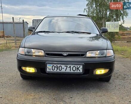 Черный Мазда 626, объемом двигателя 2.5 л и пробегом 190 тыс. км за 2800 $, фото 6 на Automoto.ua