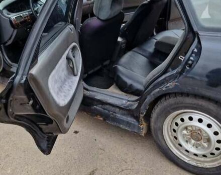 Черный Мазда 626, объемом двигателя 2.5 л и пробегом 380 тыс. км за 1500 $, фото 2 на Automoto.ua