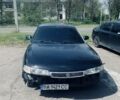 Черный Мазда 626, объемом двигателя 2 л и пробегом 200 тыс. км за 1450 $, фото 1 на Automoto.ua