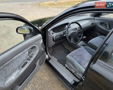 Черный Мазда 626, объемом двигателя 2.5 л и пробегом 190 тыс. км за 2800 $, фото 7 на Automoto.ua